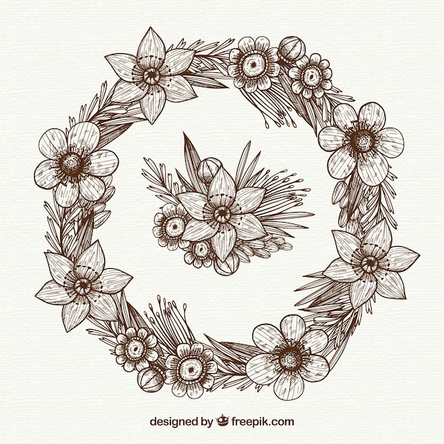 Free vector lovely floral frame with hand drawn style