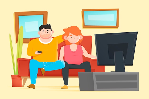 Man and woman watching a movie on their sofa