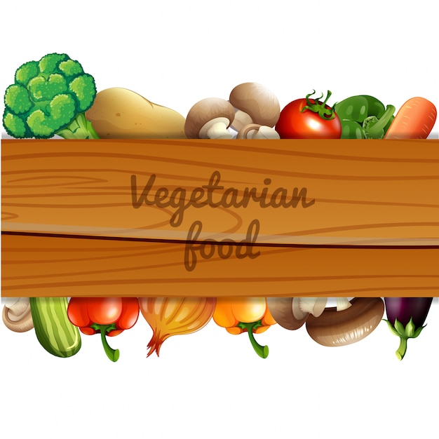 Many vegetables and wooden sign