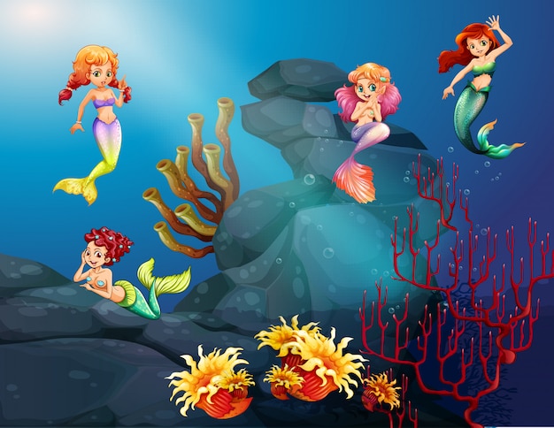 Mermaids swimming under the ocean