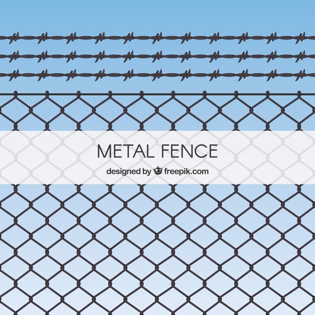 Metal fence with barbed wire with sky background