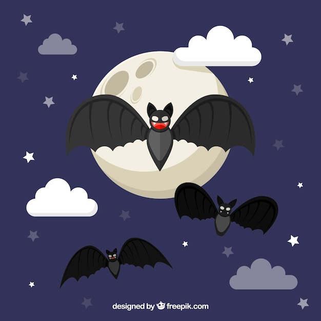 Free vector moon background with bats in flat design