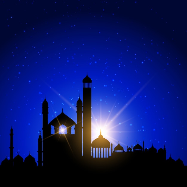 Mosque silhouette against a night sky