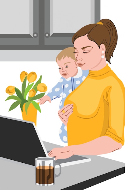 Mother with her baby in her hands working at the laptop