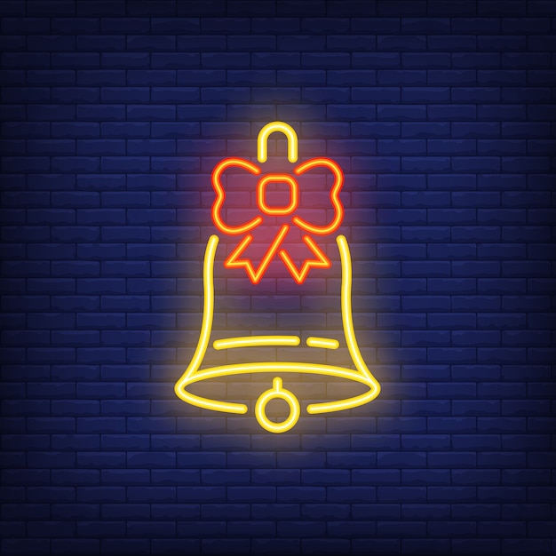 Neon Christmas bell with bow. Festive element. Celebration concept 