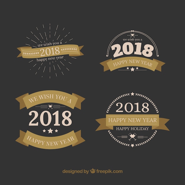 Free Vector new year badges with beige ribbons