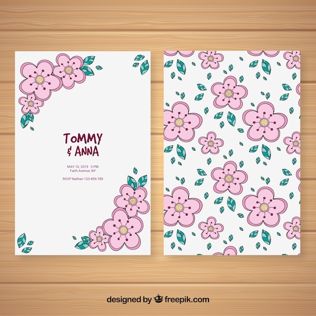 Free Vector nice hand drawn wedding invitation with a floral pattern