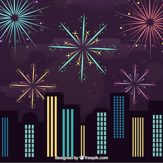 Night cityscape with fireworks and buildings