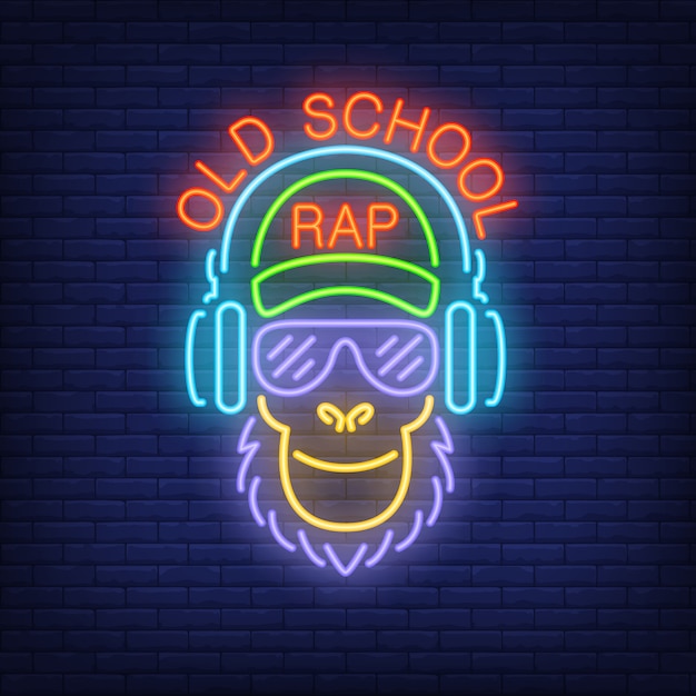 Old school rap neon text and cool monkey in glasses and headphones.