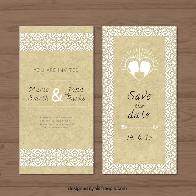 Ornamental wedding card with a couple kissing