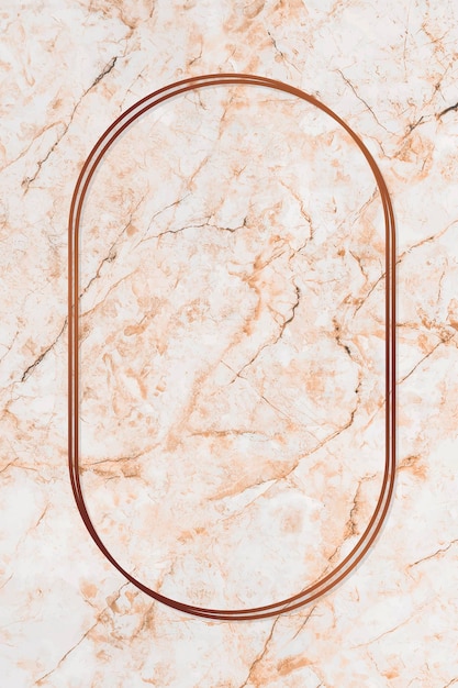 Free vector oval bronze frame on orange marble background