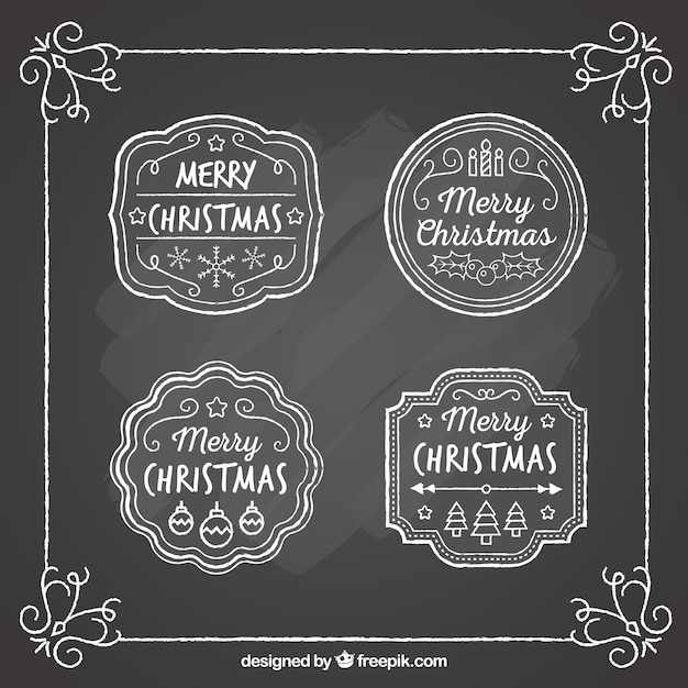 Pack of christmas badges on blackboard effect