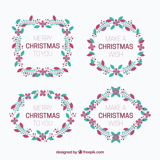 Pack of four christmas wreaths with pink flowers