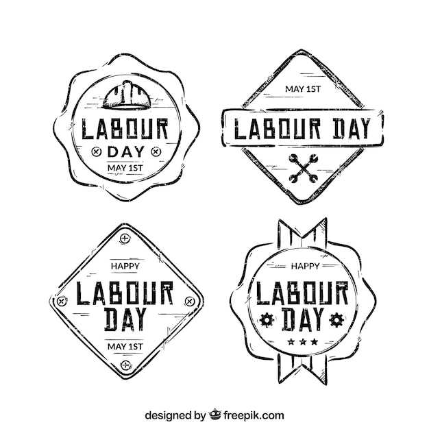 Free Vector pack of hand drawn labour day badges