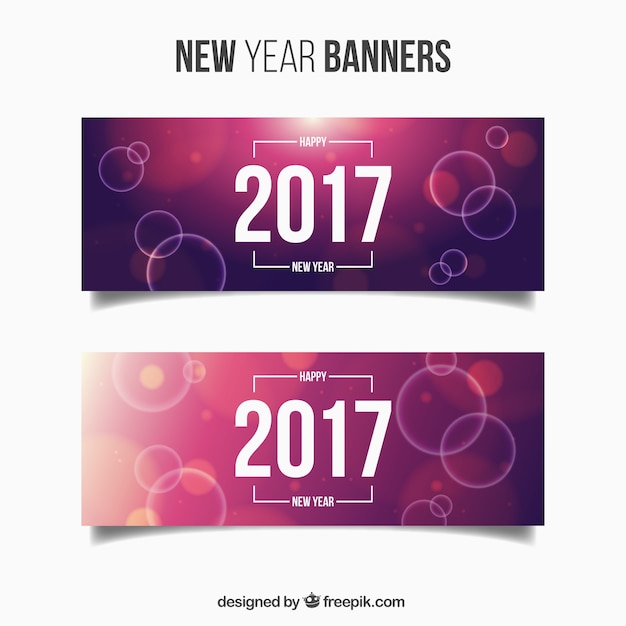 Free Vector pack of new year banners with purple backgrounds and bright circles