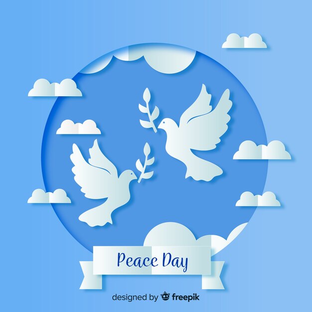 Paper peace day with dove on blue shades