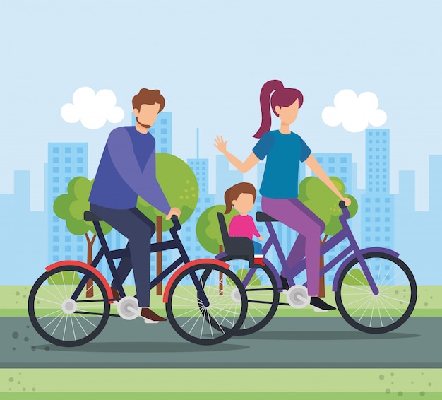 Parents in bicycle with daughter on the park