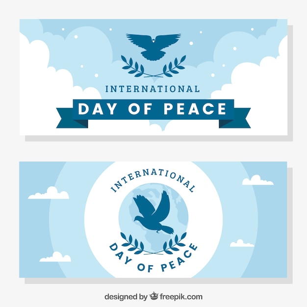 Peace day banners with pigeons silhouette