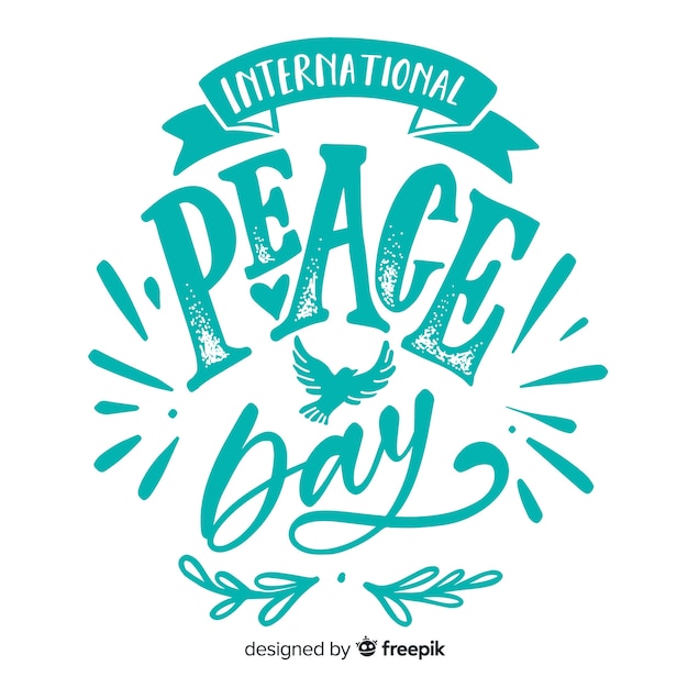 Free Vector peace day lettering with doves