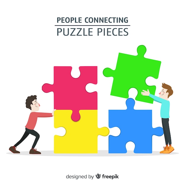 People connecting puzzle pieces