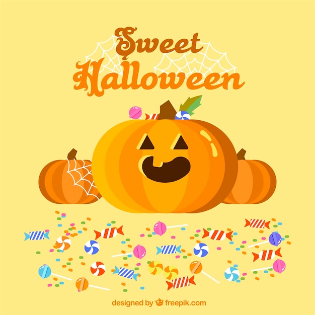 Free vector pumpkin and candy background