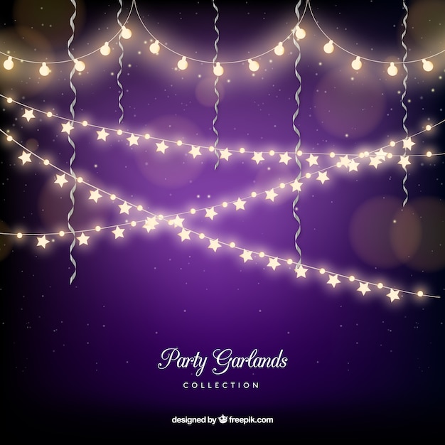 Free Vector purple bokeh background with string lights