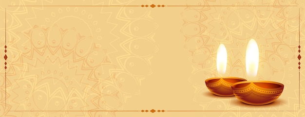 Free vector realistic diwali diya banner with text space