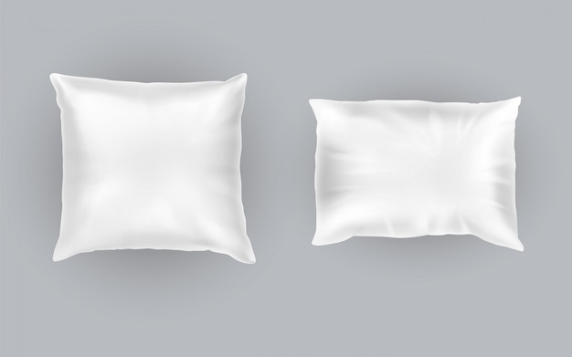 realistic set of two white pillows, square and rectangular, soft and clean