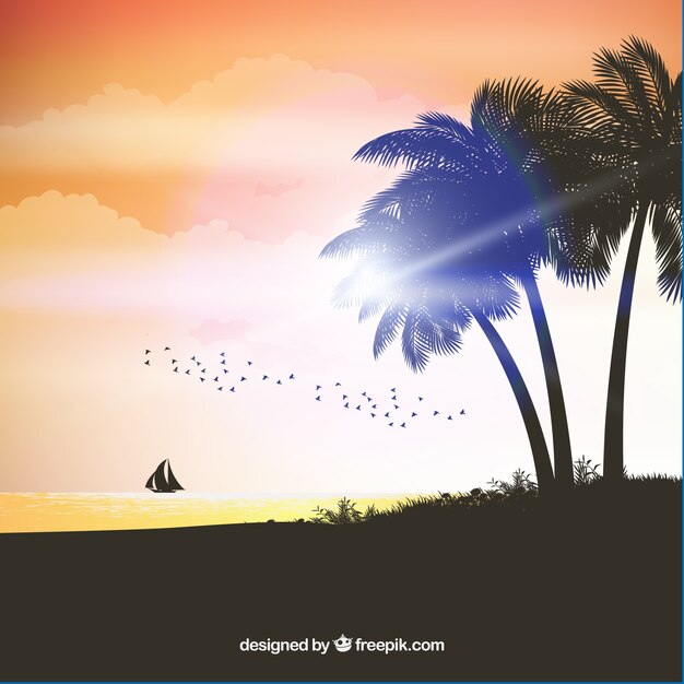 Realistic summer sunset with palm silhouettes