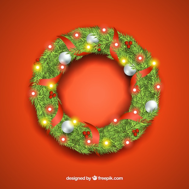 Realistic wreath decorated with christmas lights