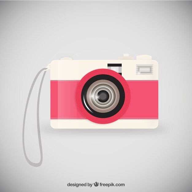 Retro camera in pink and white color