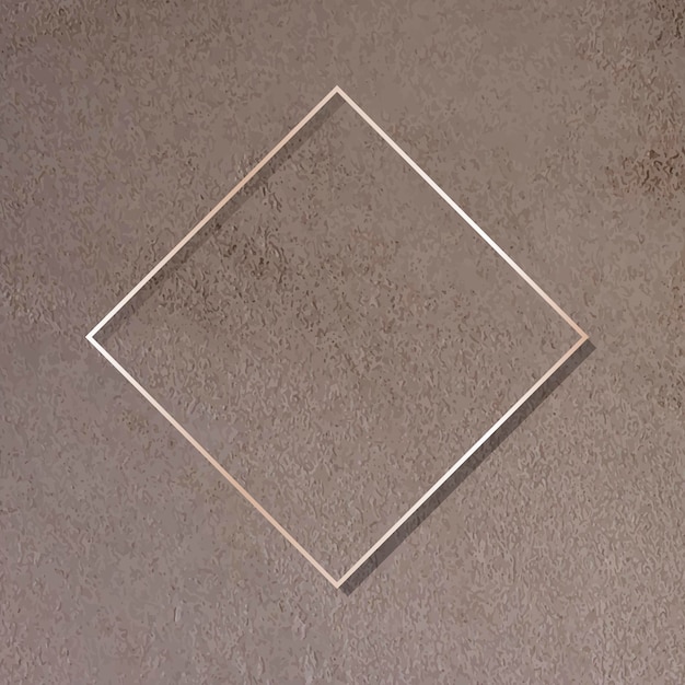 Free Vector rhombus gold frame on brown background vector