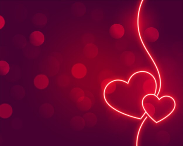 Romantic neon hearts glowing on bokeh