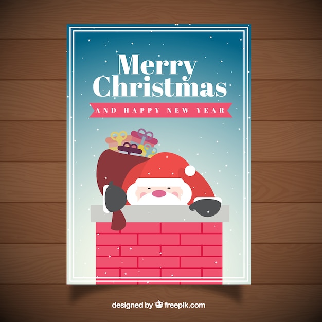 Free Vector santa claus inside a chimney card