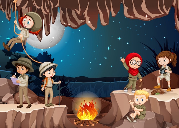 Free vector scene with group of scouts exploring the cave