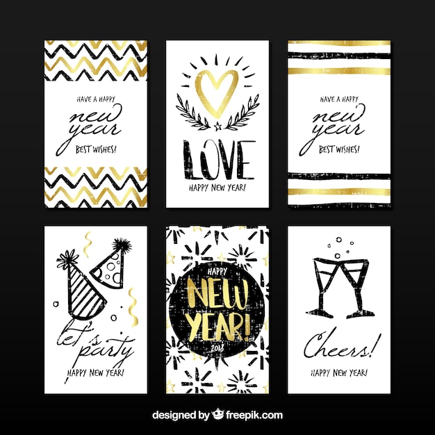 Free vector set of 6 new year greeting cards with golden elements