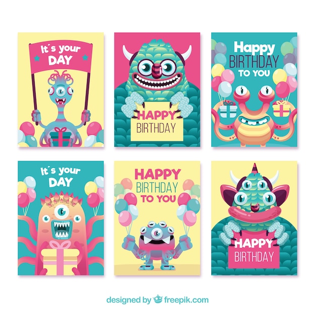 Set of birthday cards with funny monsters