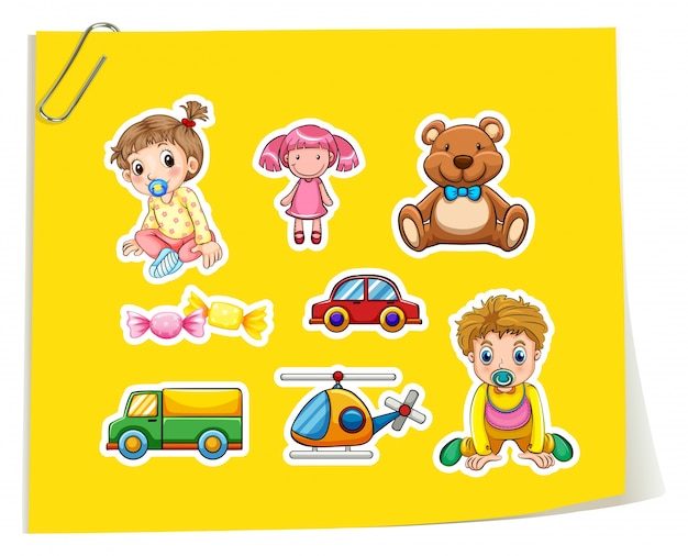 Set of children and toys on yellow paper