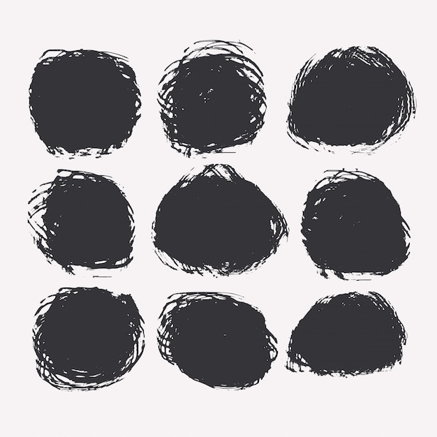 Free Vector set of circular grunge or paint stains