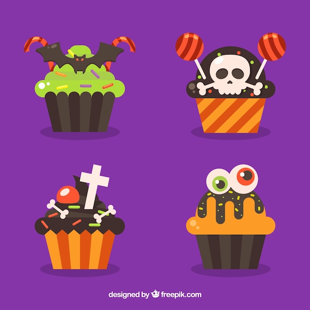 Free Vector set of cupcakes with halloween decoration