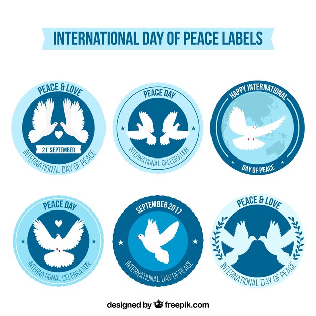 Set of labels with doves for day of peace