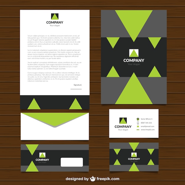 Free Vector set of modern stationery with green triangles