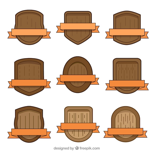 Free Vector set of wooden shields with orange ribbons