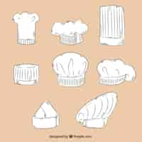 Free vector several chef hats in hand-drawn style