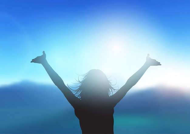 Silhouette of female with arms raised against mountain landscape