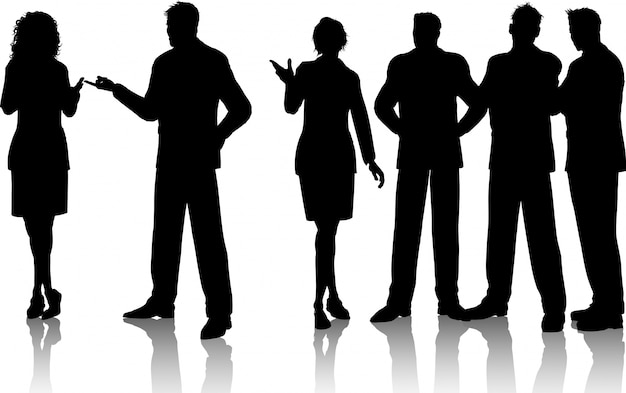 Silhouettes of a group of business people having conversations