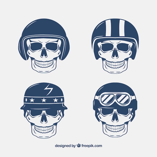 Free Vector skulls with hand-drawn helmets