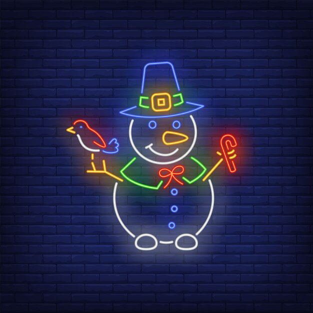 Snowman wearing witch hat, holding bird and candy cane in neon style