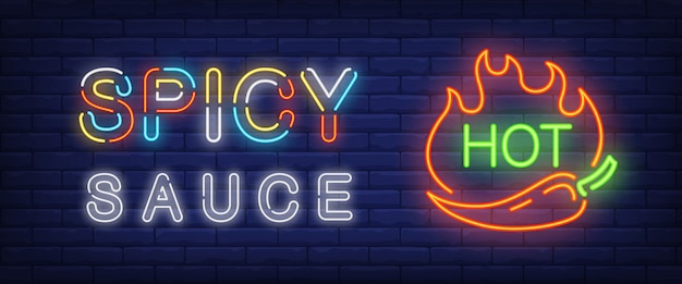 Spicy sauce, hot neon text with chili pepper and fire flames