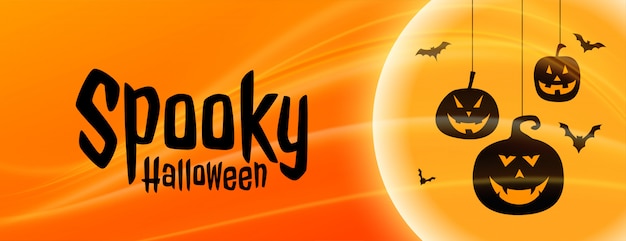 Spooky halloween banner with hanging pumpkin shapes